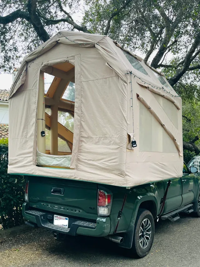 Transformer inflated in the bed of a green pickup truck